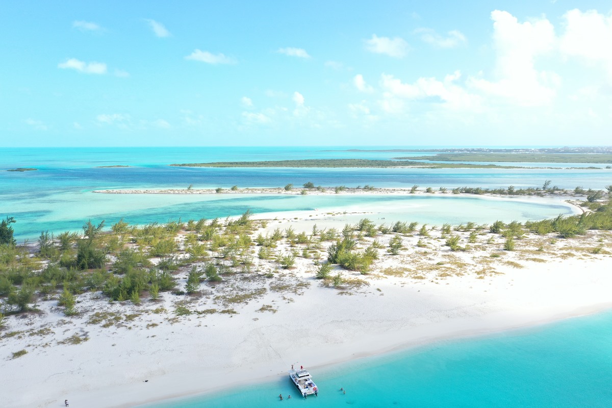 Discover peace on the white sands of the Turks & Caicos islands with Crofton & Park Concierge Travel Services
