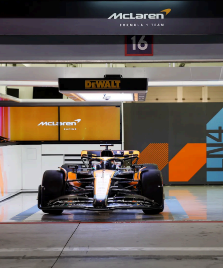 McLaren paddock experience Abu Dhabi VIP F1 pit garage hospitality Zak Brown McLaren private tour FIA motorhome interior Abu Dhabi 2019 McLaren engine cover signed Formula One Abu Dhabi finale VIP