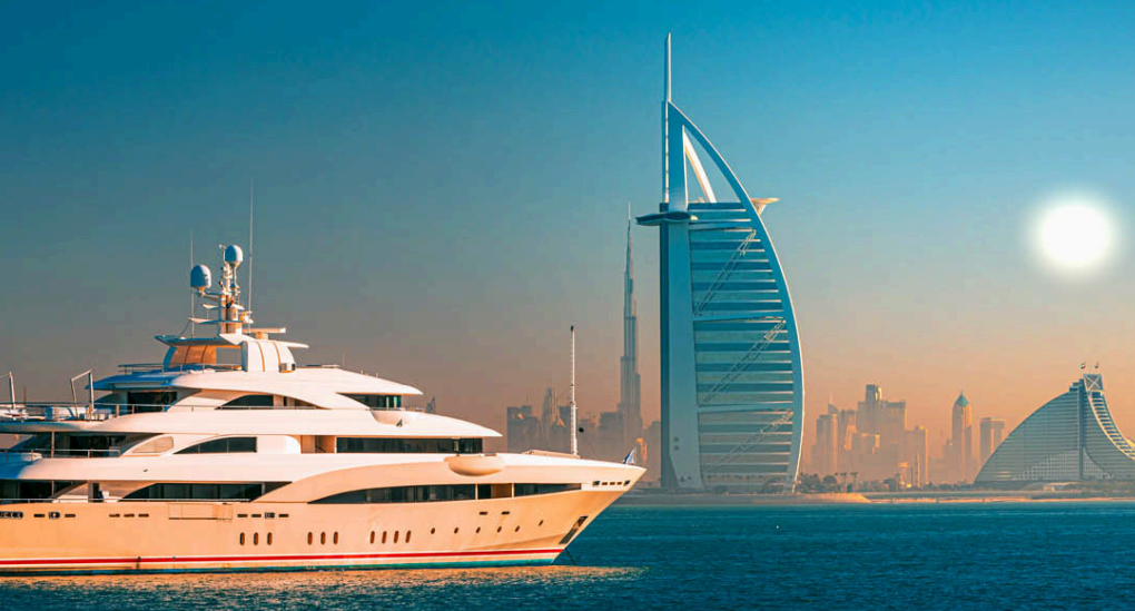 Veuve Clicquot desert dining Dubai, Ferrari desert drive UAE, luxury yacht party Dubai Marina, bespoke Louboutin boutique Dubai, Daymaniyat Islands marine life, Abu Dhabi GP paddock VIP, sunset dune lounge champagne, mega yacht under Dubai skyline